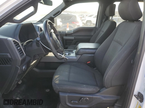 2018 Ford F-150 XL with VIN 1FTEW1E57JKE06779, listed as a Copart auction lot 84183014 with 198,203 mi miles and Salvage Title. Bid and sale history available at carsss.com. Image 7.