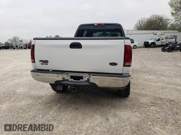 2002 Ford F-150 XL with VIN 1FTRX18L42NB60380, listed as a Copart auction lot 51806955 with 293,591 mi miles and Salvage title. Bid and sale history available at DreamBid. Image 6.