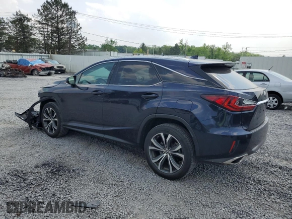 2018 Lexus RX 350 with VIN 2T2BZMCA6JC149235, listed as a Copart auction lot 59939505 with 214,676 mi miles and Salvage title. Bid and sale history available at DreamBid. Image 2.