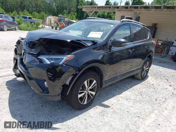 2018 Toyota RAV4 XLE z VIN 2T3WFREVXJW491725, wystawiony jako IAAI lot #42216365 z przebiegiem 76 365 mil mil oraz . Historia ofert i sprzedaży dostępna na DreamBid. Obrazek 17.