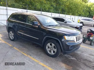 2011 Jeep Grand Cherokee Laredo with VIN 1J4RR4GG6BC550256, listed as a IAAI auction lot 42589504 with 222,608 mi miles and . Bid and sale history available at DreamBid. Image 1.