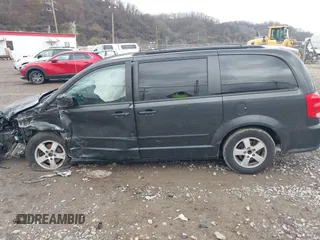 2012 Dodge Grand Caravan SXT with VIN 2C4RDGCG8CR242235, listed as a IAAI auction lot 41922083 with 124,306 mi miles and . Bid and sale history available at DreamBid. Image 14.