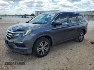 2016 Honda Pilot EX-L z VIN 5FNYF5H59GB017051, wystawiony jako Copart lot #52243005 z przebiegiem 119 889 mil mil oraz Czysty tytuł • Clean title. Historia ofert i sprzedaży dostępna na DreamBid. Obrazek 1.