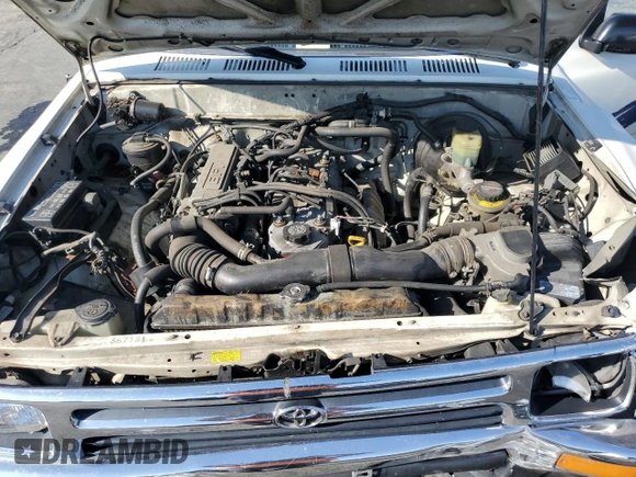 1993 Toyota Pickup DLX z VIN JT4RN93PXP5085030, wystawiony jako Copart lot #73537044 z przebiegiem 175 167 mil mil oraz Szkoda całkowita • Salvage title. Historia ofert i sprzedaży dostępna na DreamBid. Obrazek 11.