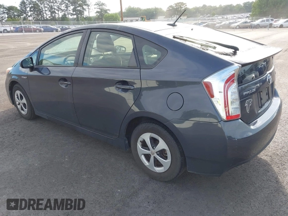 2013 Toyota Prius One with VIN JTDKN3DU7D1714636, listed as a IAAI auction lot 42207541 with 214,977 mi miles and . Bid and sale history available at DreamBid. Image 3.
