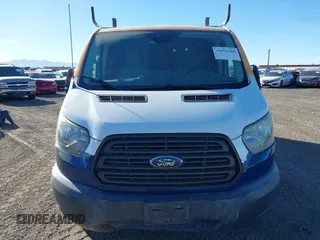 2016 Ford Transit Cargo z VIN 1FTYE1YM2GKB18602, wystawiony jako IAAI lot #41091180 z przebiegiem 143 262 mil mil oraz . Historia ofert i sprzedaży dostępna na DreamBid. Obrazek 12.