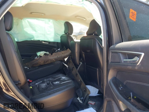 2019 Ford Edge Titanium z VIN 2FMPK3K9XKBC73014, wystawiony jako IAAI lot #42039957 z przebiegiem Nie podano mil oraz . Historia ofert i sprzedaży dostępna na DreamBid. Obrazek 8.