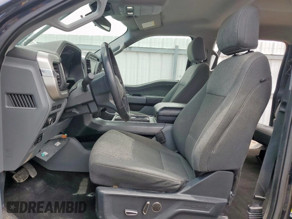 2021 Ford F-150 XL with VIN 1FTFW1E80MFA32611, listed as a Copart auction lot 61899255 with 98,278 mi miles and Salvage title. Bid and sale history available at DreamBid. Image 7.