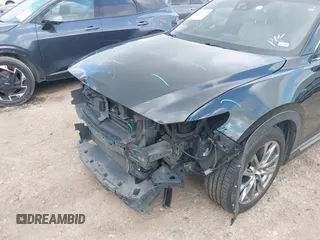 2017 Mazda CX-9 Grand Touring with VIN JM3TCADY5H0129798, listed as a IAAI auction lot 42079754 with 128,403 mi miles and . Bid and sale history available at DreamBid. Image 6.