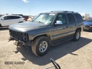 2001 Chevrolet Tahoe LT with VIN 1GNEK13T51J134291, listed as a Copart auction lot 56764365 with 218,804 mi miles and Salvage title. Bid and sale history available at DreamBid. Image 1.