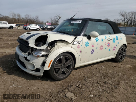 2010 MINI Convertible S with VIN WMWMS3C51ATZ85166, listed as a Copart auction lot 52907775 with 90,090 mi miles and Salvage title. Bid and sale history available at DreamBid. Image 1.