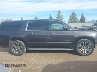 2017 GMC Yukon XL Denali with VIN 1GKS2HKJ5HR369939, listed as a IAAI auction lot 41446415 with 159,056 mi miles. Bid and sale history available at carsss.com. Image 13.