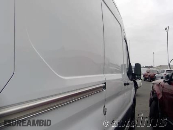2021 Ford Transit Cargo z VIN 1FTYE1C84MKA94597, wystawiony jako IAAI lot #42704426 z przebiegiem 74 850 mil mil oraz . Historia ofert i sprzedaży dostępna na DreamBid. Obrazek 6.