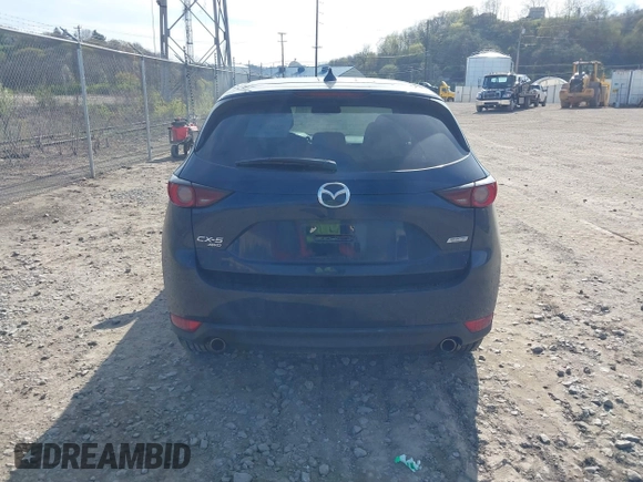 2019 Mazda CX-5 Touring with VIN JM3KFBCM8K0518806, listed as a IAAI auction lot 42038168 with 61,449 mi miles and . Bid and sale history available at DreamBid. Image 16.