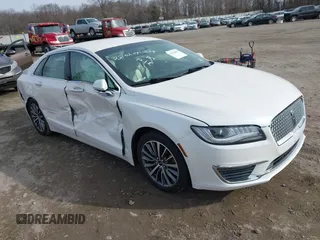 2018 Lincoln MKZ Premiere z VIN 3LN6L5A92JR613326, wystawiony jako IAAI lot #41520965 z przebiegiem 164 177 mil mil oraz . Historia ofert i sprzedaży dostępna na DreamBid. Obrazek 1.