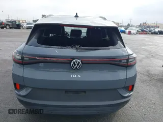 2023 Volkswagen ID.4 S z VIN 1V25MPE80PC051099, wystawiony jako IAAI lot #41332507 z przebiegiem 12 037 mil mil oraz . Historia ofert i sprzedaży dostępna na DreamBid. Obrazek 16.