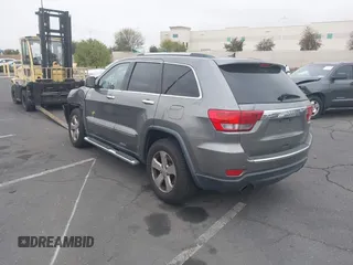2013 Jeep Grand Cherokee Limited with VIN 1C4RJEBTXDC539433, listed as a IAAI auction lot 42046724 with 266,913 mi miles. Bid and sale history available at carsss.com. Image 3.