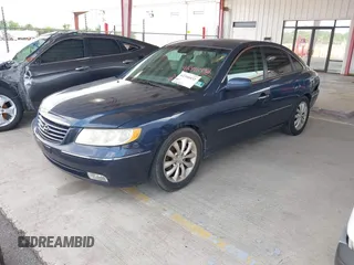 2007 Hyundai Azera SE z VIN KMHFC46FX7A147219, wystawiony jako IAAI lot #42346432 z przebiegiem 163 646 mil mil oraz . Historia ofert i sprzedaży dostępna na DreamBid. Obrazek 2.