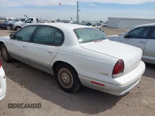 1997 Chrysler LHS z VIN 2C3HC56F0VH558148, wystawiony jako IAAI lot #42341320 z przebiegiem 144 372 mil mil oraz . Historia ofert i sprzedaży dostępna na DreamBid. Obrazek 3.