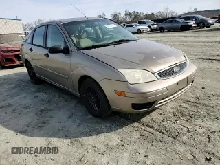 2005 Ford Focus S with VIN 1FAFP34N35W141023, listed as a Copart auction lot 84230574 with 244,545 mi miles and Salvage Title. Bid and sale history available at carsss.com. Image 11.