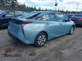2018 Toyota Prius Two with VIN JTDKBRFU7J3590988, listed as a IAAI auction lot 41876636 with 72,851 mi miles. Bid and sale history available at carsss.com. Image 4.