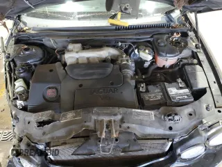 2003 Jaguar X-Type 3.0L z VIN SAJEA51C33WD25630, wystawiony jako Copart lot #57795475 z przebiegiem 135 514 mil mil oraz Szkody całkowita. Historia ofert i sprzedaży dostępna na DreamBid. Obrazek 11.
