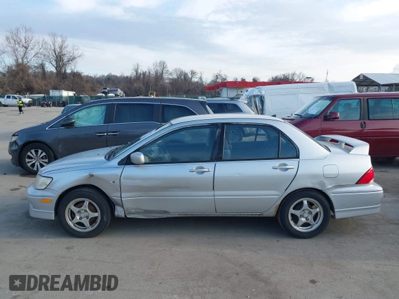 2003 Mitsubishi Lancer OZ-Rally with VIN JA3AJ86E63U022390, listed as a IAAI auction lot 41542407 with 184,639 mi miles. Bid and sale history available at carsss.com. Image 14.