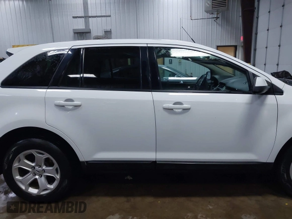 2014 Ford Edge SEL z VIN 2FMDK4JC9EBB06783, wystawiony jako IAAI lot #42047206 z przebiegiem 125 963 mil mil oraz . Historia ofert i sprzedaży dostępna na DreamBid. Obrazek 13.