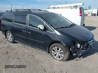 2015 Honda Odyssey EX-L with VIN 5FNRL5H65FB088106, listed as a IAAI auction lot 41880915 with 176,539 mi miles and . Bid and sale history available at carsss.com. Image 1.