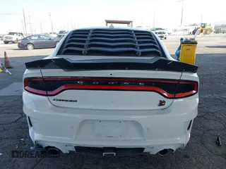 2023 Dodge Charger Scat Pack Widebody with VIN 2C3CDXGJ6PH635498, listed as a IAAI auction lot 41448100 with 13,678 mi miles and . Bid and sale history available at DreamBid. Image 17.