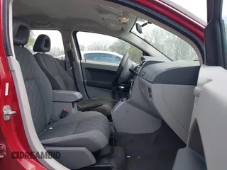 2007 Dodge Caliber SXT with VIN 1B3HB48B87D558516, listed as a IAAI auction lot 42004401 with 217,733 mi miles and . Bid and sale history available at DreamBid. Image 5.