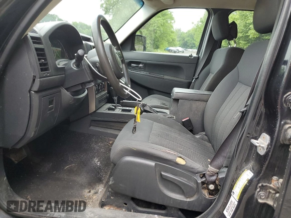 2012 Jeep Liberty Sport with VIN 1C4PJMAK9CW212920, listed as a Copart auction lot 61192785 with 181,561 mi miles and Salvage title. Bid and sale history available at DreamBid. Image 7.