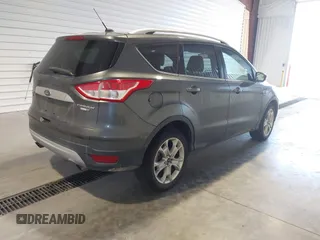 2016 Ford Escape Titanium with VIN 1FMCU9J9XGUC30596, listed as a IAAI auction lot 42024166 with 179,340 mi miles. Bid and sale history available at carsss.com. Image 4.