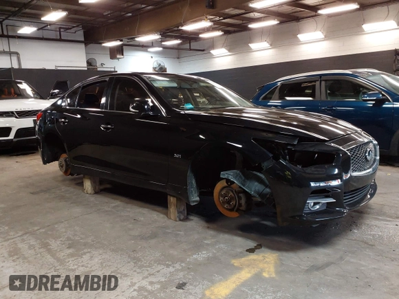 2017 Infiniti Q50 Premium z VIN JN1EV7AR7HM834870, wystawiony jako IAAI lot #42381151 z przebiegiem 89 438 mil mil oraz . Historia ofert i sprzedaży dostępna na DreamBid. Obrazek 1.