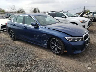 2021 BMW 3 Series 330i xDrive with VIN 3MW5R7J03M8B90260, listed as a Copart auction lot 52482935 with 31,373 mi miles and Salvage Title. Bid and sale history available at DreamBid. Image 4.