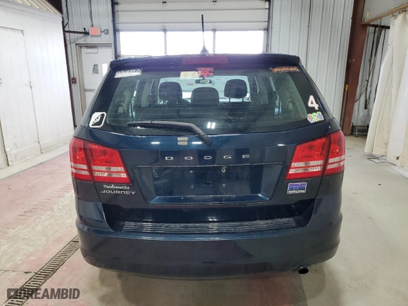 2013 Dodge Journey American Value Pkg with VIN 3C4PDCAB6DT560702, listed as a Copart auction lot 53048435 with 124,467 mi miles and Salvage Title. Bid and sale history available at carsss.com. Image 6.