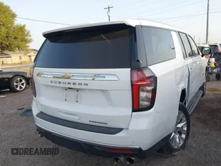 2022 Chevrolet Suburban Premier with VIN 1GNSCFKDXNR180648, listed as a IAAI auction lot 41853881 with 73,023 mi miles and . Bid and sale history available at DreamBid. Image 4.