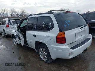2005 GMC Envoy SLT with VIN 1GKDT13S352165407, listed as a IAAI auction lot 41345208 with 251,468 mi miles. Bid and sale history available at carsss.com. Image 3.