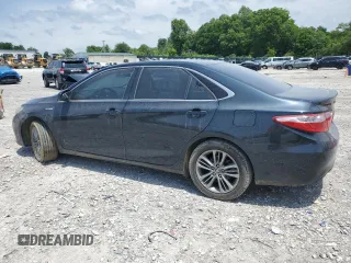 2015 Toyota Camry LE z VIN 4T1BD1FK9FU142761, wystawiony jako Copart lot #56158295 z przebiegiem 127 761 mil mil oraz Szkoda całkowita • Salvage title. Historia ofert i sprzedaży dostępna na DreamBid. Obrazek 2.
