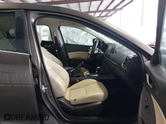 2015 Mazda 3 i Touring with VIN 3MZBM1V72FM215729, listed as a IAAI auction lot 42191673 with 141,471 mi miles and . Bid and sale history available at DreamBid. Image 5.