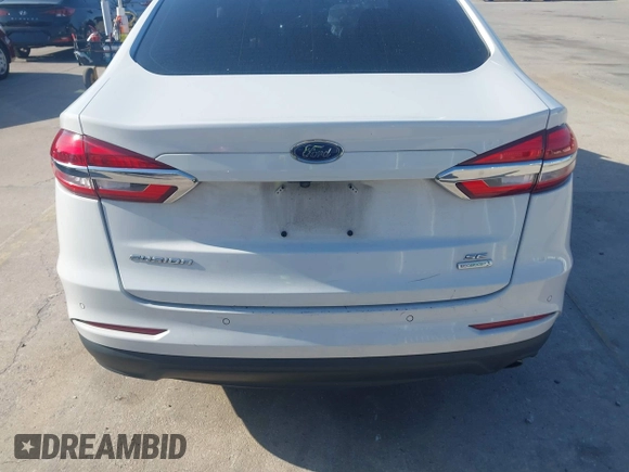 2019 Ford Fusion SE with VIN 3FA6P0HD1KR217840, listed as a IAAI auction lot 42011309 with 85,945 mi miles and . Bid and sale history available at carsss.com. Image 16.