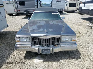 1991 Cadillac Brougham z VIN 1G6DW54E6MR718286, wystawiony jako Copart lot #54732145 z przebiegiem Nie podano mil oraz Tytuł czysty. Historia ofert i sprzedaży dostępna na DreamBid. Obrazek 5.
