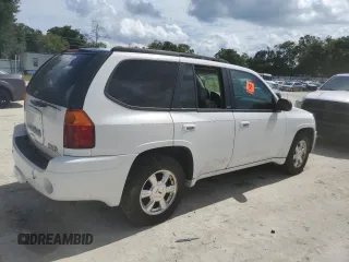 2005 GMC Envoy SLT with VIN 1GKDT13S052311455, listed as a Copart auction lot 73635434 with Not Provided miles and Salvage Title. Bid and sale history available at DreamBid. Image 3.