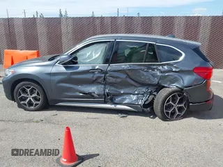 2018 BMW X1 xDrive28i with VIN WBXHT3C30J5L34702, listed as a IAAI auction lot 41935803 with 42,174 mi miles. Bid and sale history available at carsss.com. Image 14.