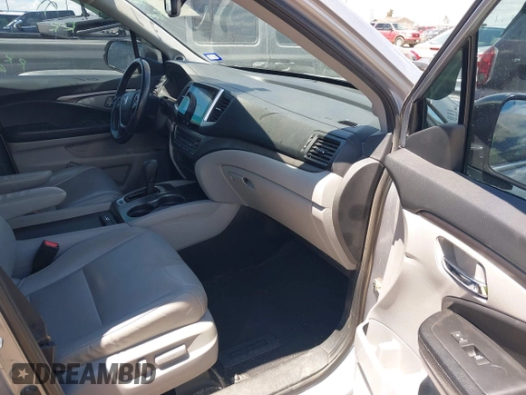 2018 Honda Pilot EX-L with VIN 5FNYF5H61JB008134, listed as a IAAI auction lot 42193142 with 100,254 mi miles and . Bid and sale history available at DreamBid. Image 5.
