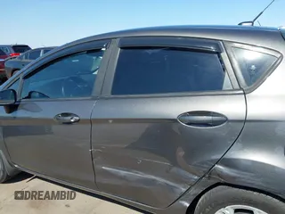 2015 Ford Fiesta SE z VIN 3FADP4EJ0FM146237, wystawiony jako IAAI lot #42452345 z przebiegiem 121 742 mil mil oraz . Historia ofert i sprzedaży dostępna na DreamBid. Obrazek 14.