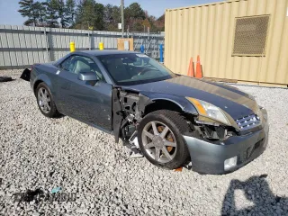 2004 Cadillac XLR z VIN 1G6YV34A845603654, wystawiony jako Copart lot #83494824 z przebiegiem 89 609 mil mil oraz Szkoda całkowita • Salvage title. Historia ofert i sprzedaży dostępna na DreamBid. Obrazek 4.