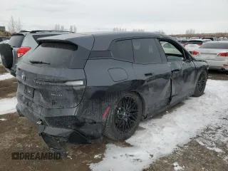 2022 BMW iX xDrive50 with VIN WB523CF05NCJ43021, listed as a Copart auction lot 87864125 with 28,976 mi miles and Salvage Title. Bid and sale history available at carsss.com. Image 3.