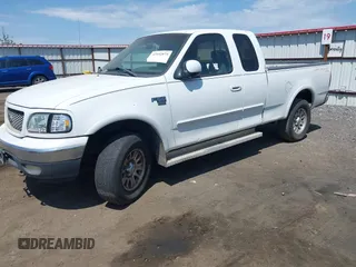 2001 Ford F-150 XL with VIN 1FTRX18L71NA62779, listed as a IAAI auction lot 42492875 with Not provided miles and . Bid and sale history available at DreamBid. Image 2.