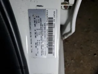 2010 Mazda 3 i SV with VIN JM1BL1SF8A1321433, listed as a Copart auction lot 87724715 with 120,424 mi miles and Salvage Title. Bid and sale history available at DreamBid. Image 12.